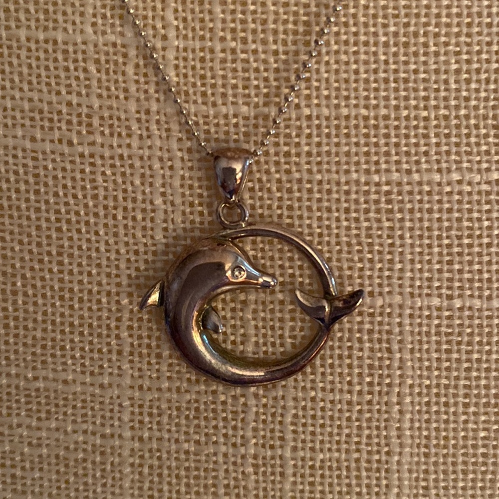STERLING SILVER RHINESTONE ACCENTED DOLPHIN PENDANT AVON
